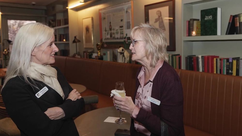 Two guests in conversation